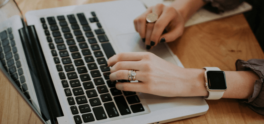 hand on laptop